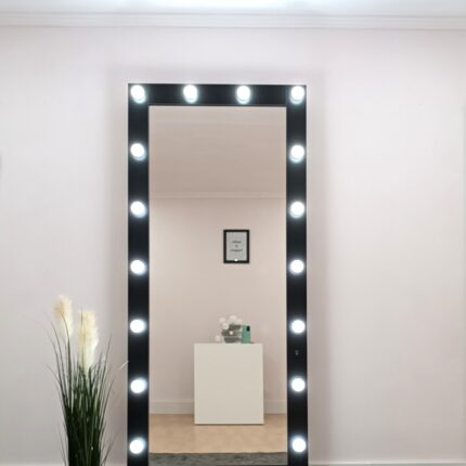 Mirror with black frame and stand